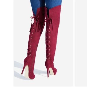 Thigh high stilletos